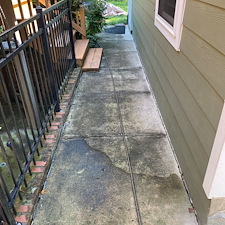 Concrete-Sidewalk-Cleaning-Along-Side-of-Home-in-Lorton-VA 0